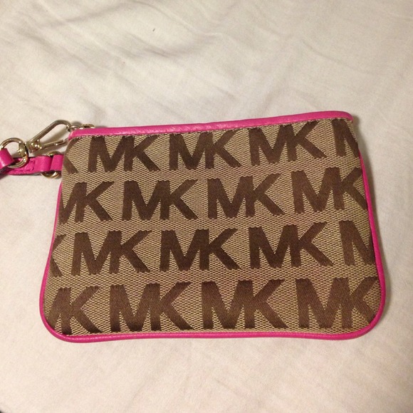 DISCOUNTED! ON HOLD!!! Michael kors wristlet
