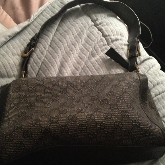 Gucci denim authentic, practically new!