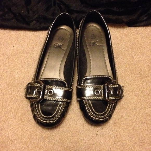 Black buckle flats
