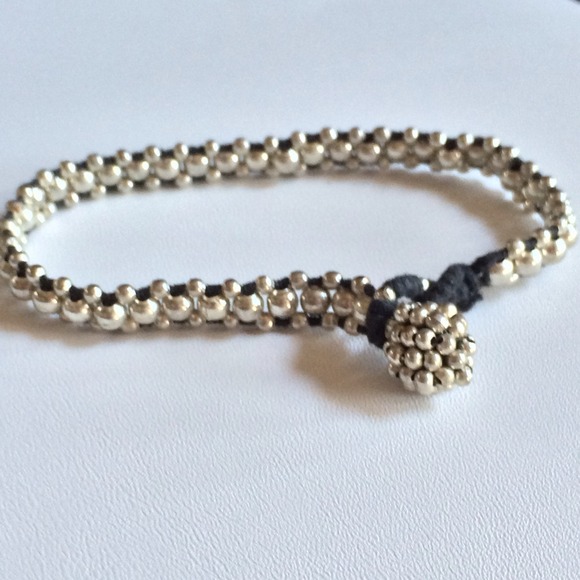NWOT Silver braided bracelet.