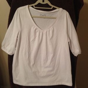 V-neck white blouse / top.  Bell sleeves.