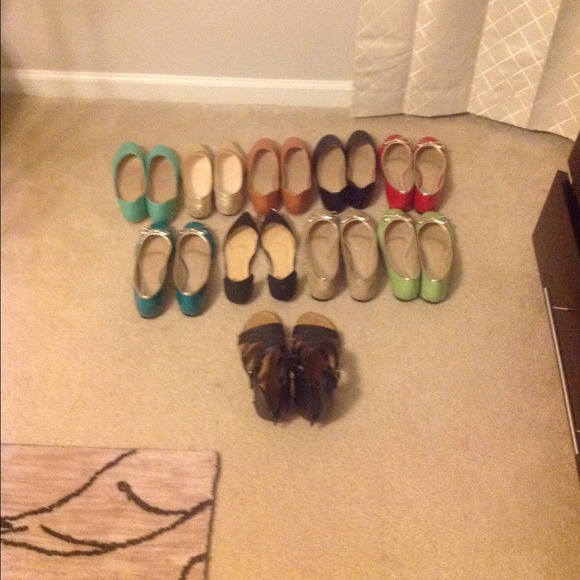 9 pair of ballet flats and a pair of sandals