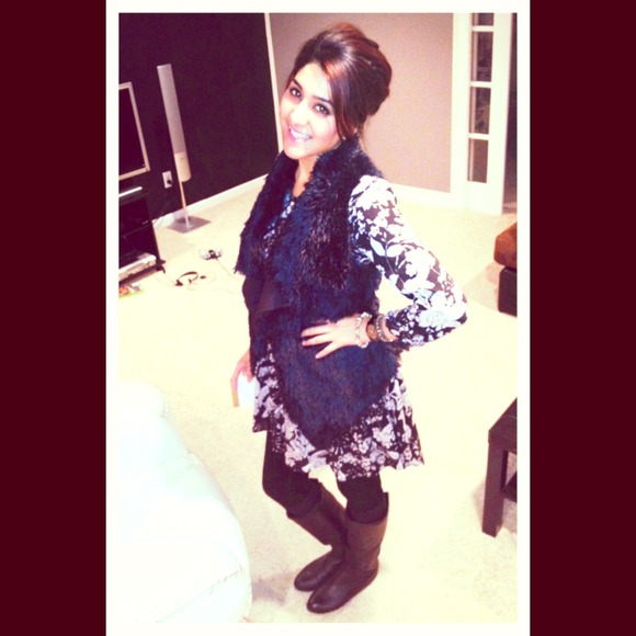 Black fur vest in the picture , super comfy