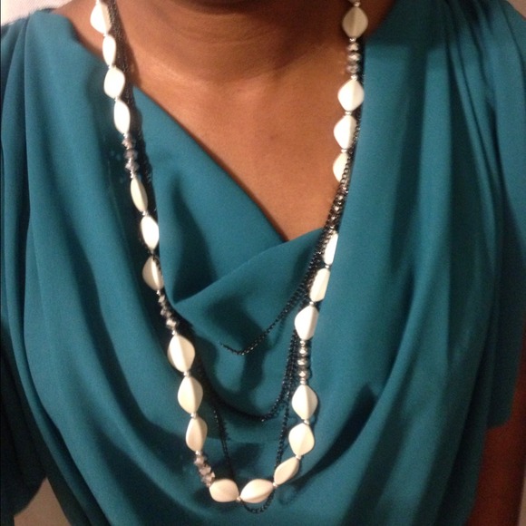 Ivory/silver beaded long necklace w/ black chains.