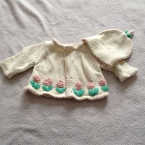 Baby girl sweater and hat.