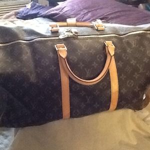 Authentic Louis Vuitton keepall Bandouliere 55
