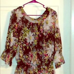 See threw long sleeved flowered top