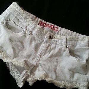 White denim shorts with leave trim