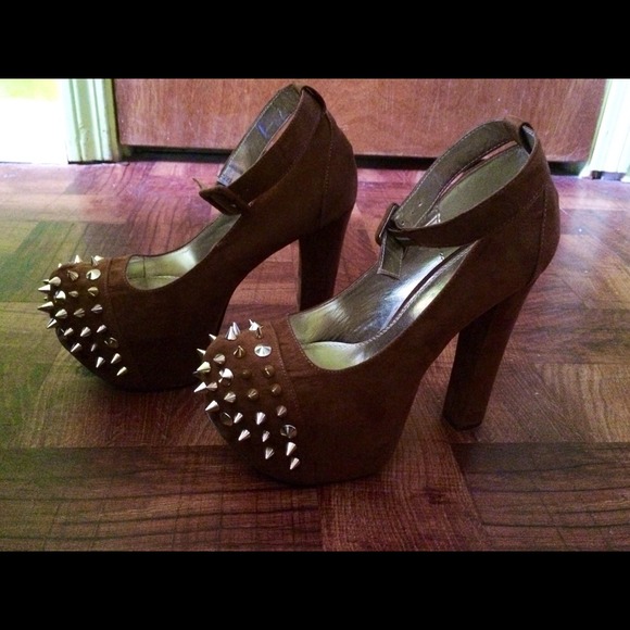 Brown and gold spiked heels