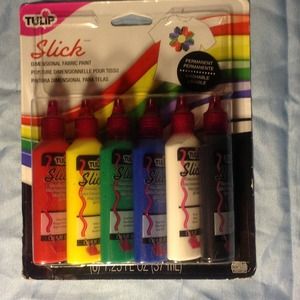 Fabric paint, studs, glue gun, glue sticks.