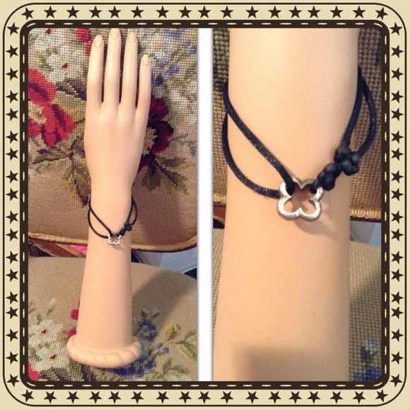 Heidi Klum Silver clover on satin cord. 925