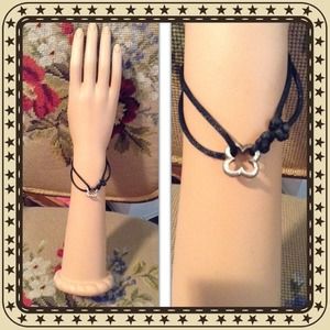 Heidi Klum Silver clover on satin cord. 925