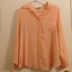 Cute peach colored blouse.