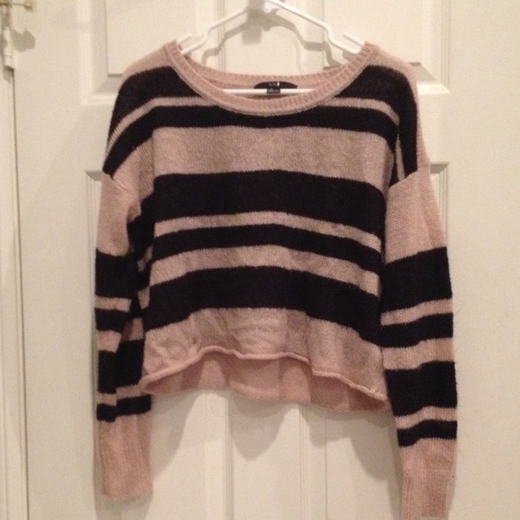 Beige/black striped sweater.