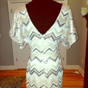 Beautiful assymetrical party dress. Fits perfect