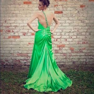 Green one shoulder prom dress.