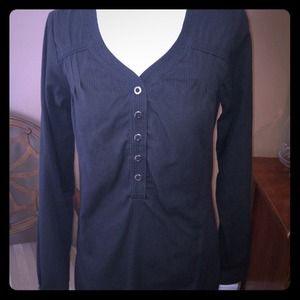 North face button front shirt.