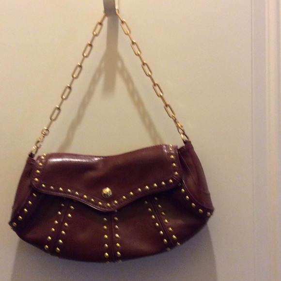 Max purse. Rich burgundy color with gold studs.