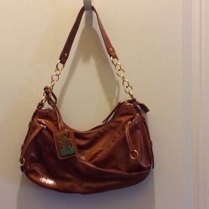 Maxx NY chestnut color purse.