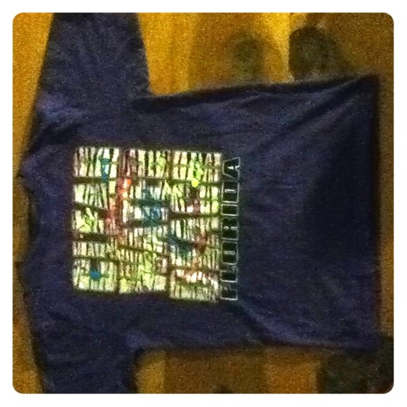 Purple t-shirt.