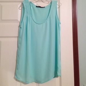 Light blue sleeveless blouse