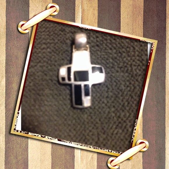 Sterling Silver cross with mother of pearl/onyx.