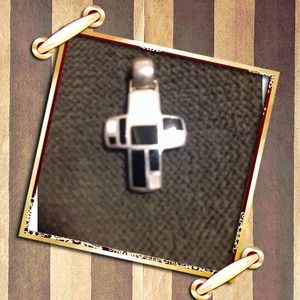 Sterling Silver cross with mother of pearl/onyx.