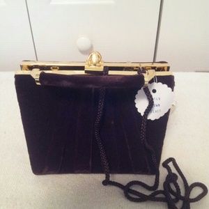 A purple cocktail trendy purse.
