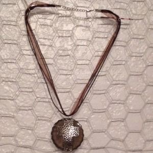Bottle cap necklace with cross insert
