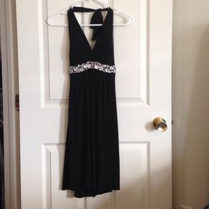 Black cocktail dress with rhinestones.