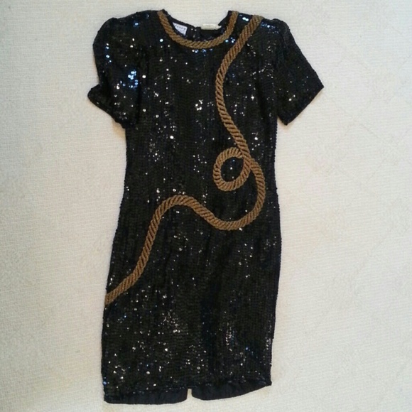 Black formal sequined dress with gold rope detail.