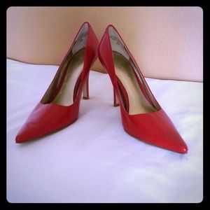 Nine West red pointy pumps