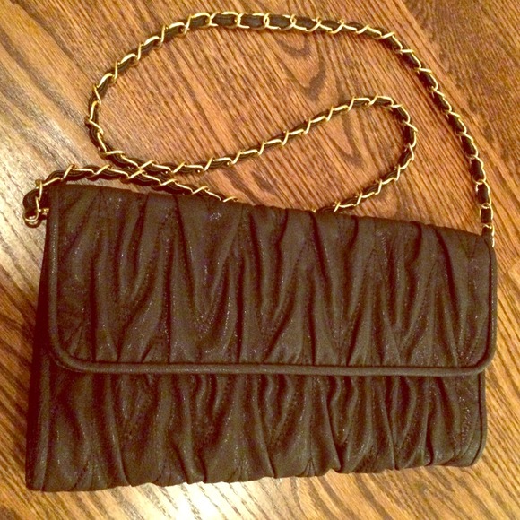 Convertible clutch or mini cross body handbag