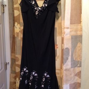 Black, beaded sheer dress.