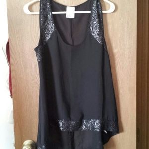 Sequence lining sheer black top.