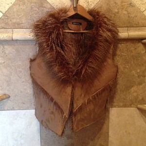 Faux fur vest size L but runs small