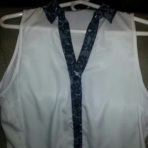Silky L Charlotte Russe, sleeveless, button up.
