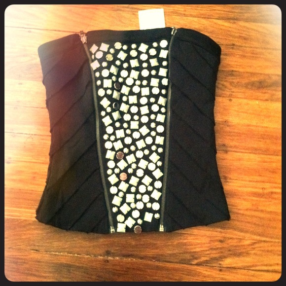 Nwt bebe corset. Missing bead shown in pic.