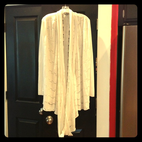 Cream-colored wrap sweater by Premise