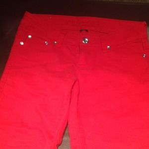 Bright red skinny jeans