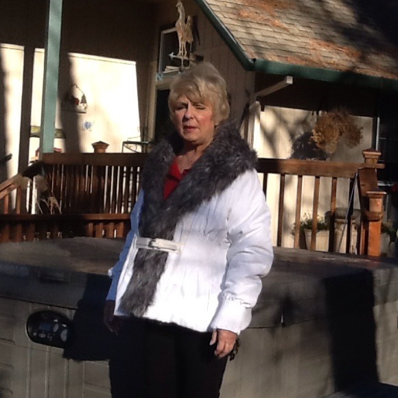 White warm winter jacket. Grey faux collar.