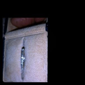 Diamond channel set eternity band