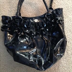 Shiny black ruffled purse
