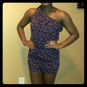 One shoulder pink and black floral romper