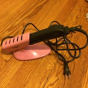 Hair straightener with cooling stand