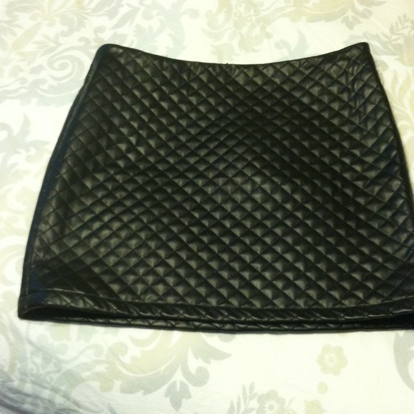 Black faux leather quilted mini skirt