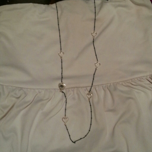Green Aeropostale necklace with silver hearts.