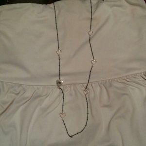 Green Aeropostale necklace with silver hearts.