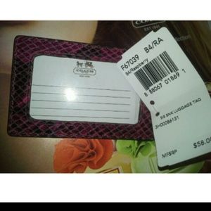 Coach Embossed Exotic Leather.