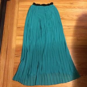 Green pleated skirt